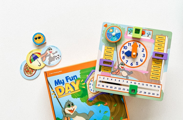 My Fun Day preschool activity board helps teach kids about telling time, weather, and seasons