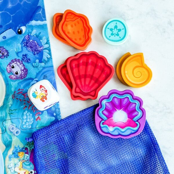 Shelly's Pearl by SimplyFun is an early trading game for ages 4 and up.-SimplyFun