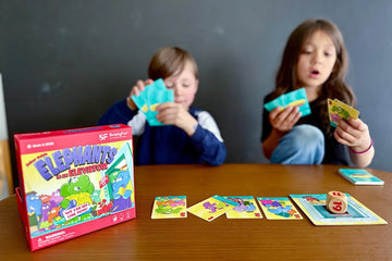 Two kindergarten kids playing math counting on game, Elephants in an Elevator.