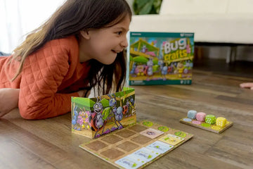 Photo of child playing resource management and planning game, Bug Crafts!