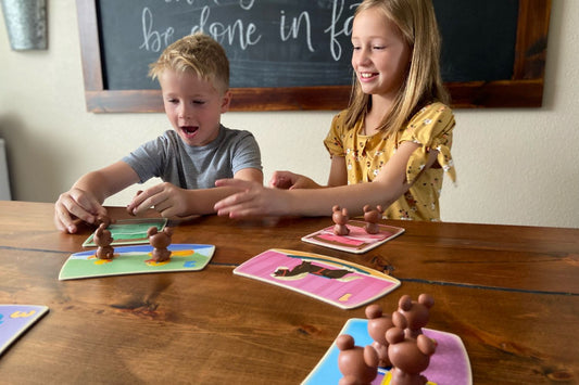 Kids playing number recognition activities for preschoolers - Uncle Beary's Bedtime.