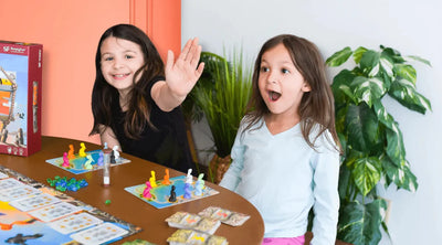 Young sisters playing a 2-player game on Valentine's Day