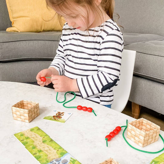 preschool counting games for preschoolers - photo of child playing math game Share a Berry