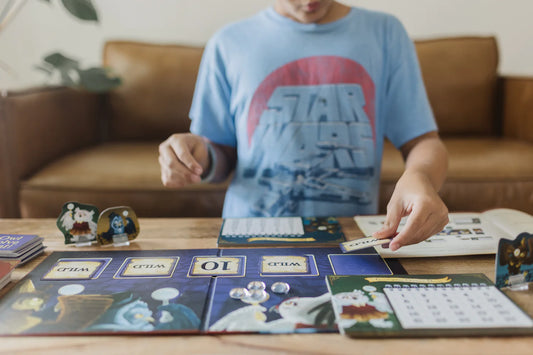 Board Game Gift Guide - boy with present