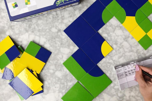 Photo of tile spatial reasoning math game for adults, Trifusion.