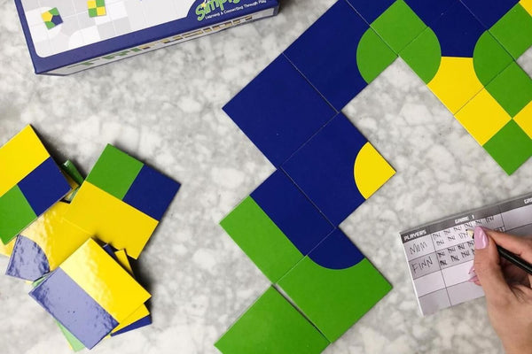 Photo of tile spatial reasoning math game for adults, Trifusion.