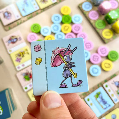 Bug Crafts is a resource management board game where kids ages 8+ plan and trade materials at a bug market to craft goods for their bug friends.