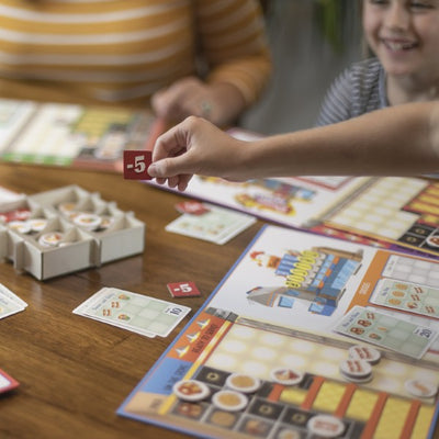 Dish 'em Out by SimplyFun is a fun restaurant and diner strategy game for ages 8 and up