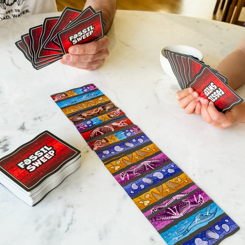 Fossil Sweep by SimplyFun, a fun fossil-themed card game for ages 8 and up.