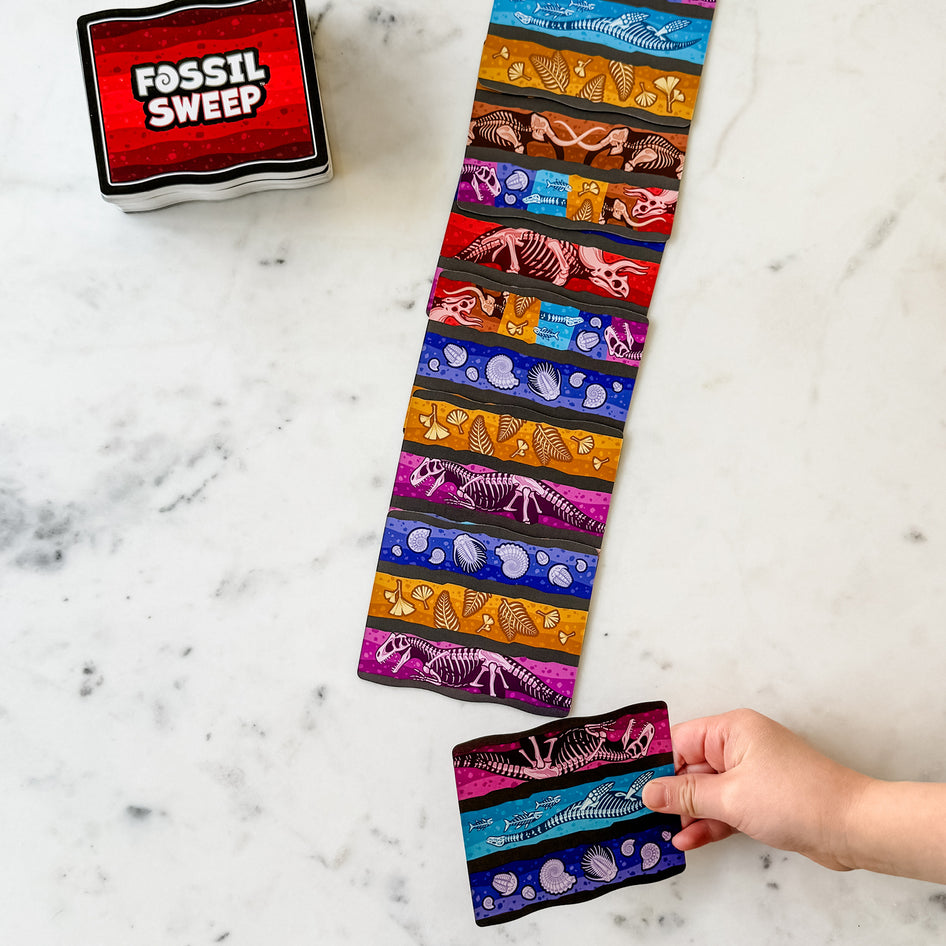 Fossil Sweep by SimplyFun, a fun fossil-themed card game for ages 8 and up.