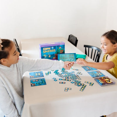 Glow Spotters by SimplyFun is an early addition game which also helps with spatial reasoning for ages 5 and up.