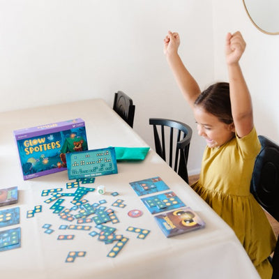 Glow Spotters by SimplyFun is an early addition game which also helps with spatial reasoning for ages 5 and up.