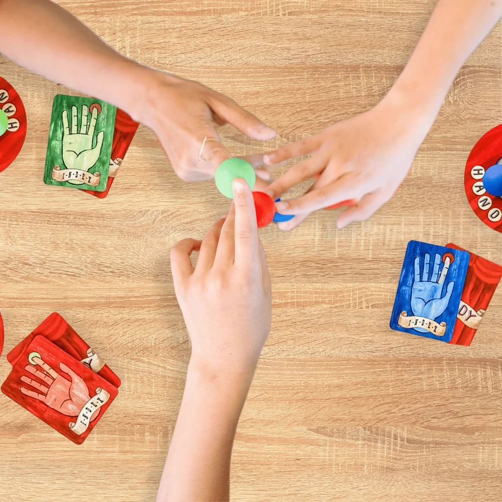 Handy by SimplyFun is a fun collaborative game focusing on fine motor skills and teamwork for ages 8 and up.-SimplyFun