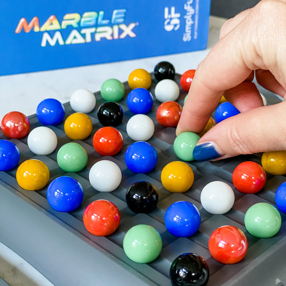 Marble Matrix is a fun matching and spatial reasoning game for ages 7 and up.