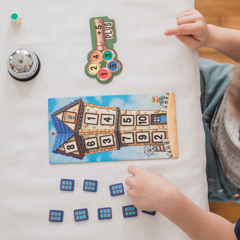 Math Room by SimplyFun is a fun math game teaching addition, subtraction, and quick thinking.