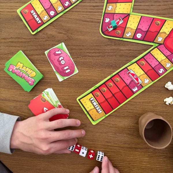 Math'd Potatoes by SimplyFun is a great math game focusing on solving equations quickly. For ages 8 and up.-SimplyFun