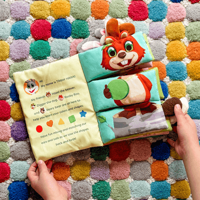 My Fun Buddy Book by SimplyFun, a colorful and textured cloth book where the buddies can be mixed and matched.