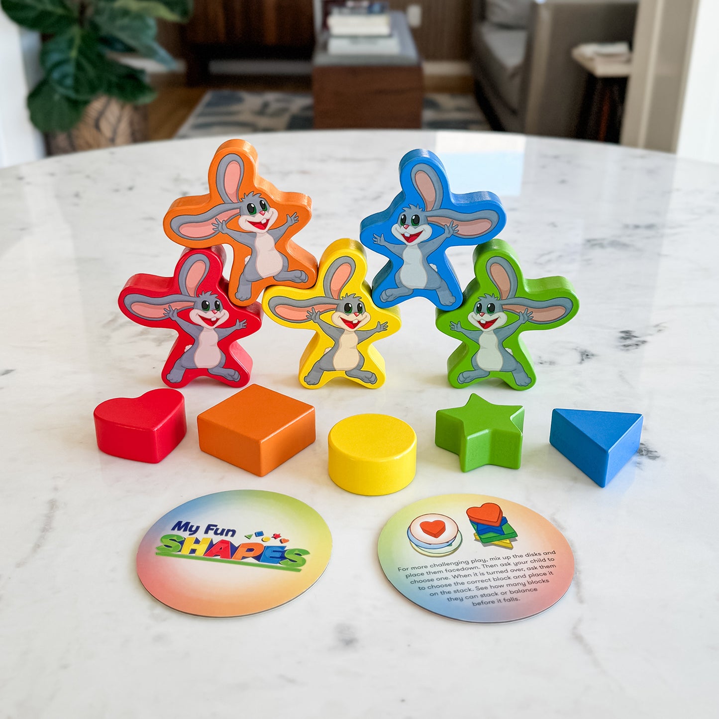 My Fun Shapes by SimplyFun. 30 wooden blocks and disc cards to aid in learning colors and shapes, and practicing fine motor skills.-SimplyFun