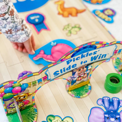 Pickles' Slide to Win by SimplyFun is an eye-hand coordinaion game which teaches taking turns for ages 4 and up.