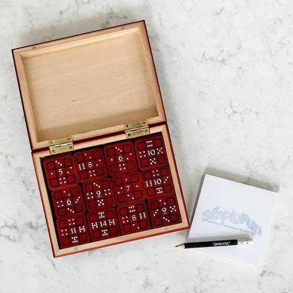 Quartile by SimplyFun is a fun math game focusing on addition and spatial reasoning for ages 8 and up.-SimplyFun