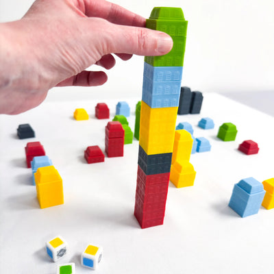 Raise the Roofs by SimplyFun is a problem solving game and strategy game for ages 8 and up.