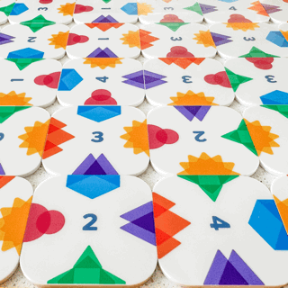 SlideAscope by SimplyFun is a spatial reasoning and critical thinking game for 1-5 players.