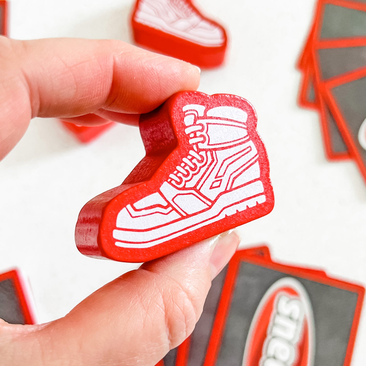 Sneaks by SimplyFun is a a quick thinking and decision making game featuring cute wooden sneakers.