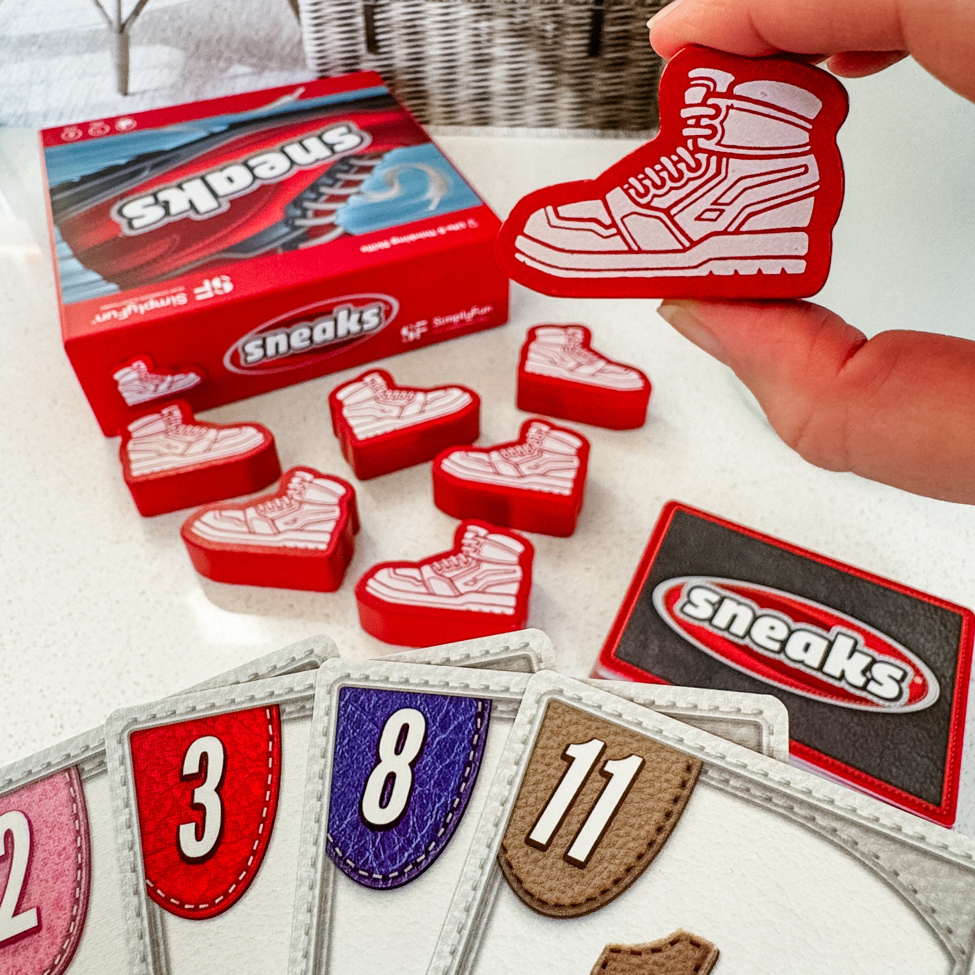 Think Quick in the Family-Fun Strategy Card Game, Sneaks!