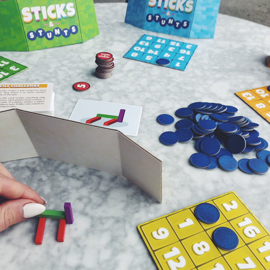 Sticks and Stunts by SimplyFun is a collaborative game and communication game focusing on fine motor skills.