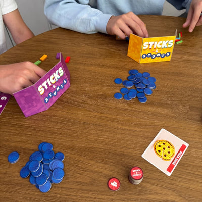 Sticks and Stunts by SimplyFun is a collaborative game and communication game focusing on fine motor skills.
