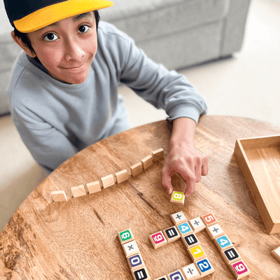 Sumology by SimplyFun is a fun math game focusing on addition, multiplication, subtraction, and division. It's like scrabble for math.