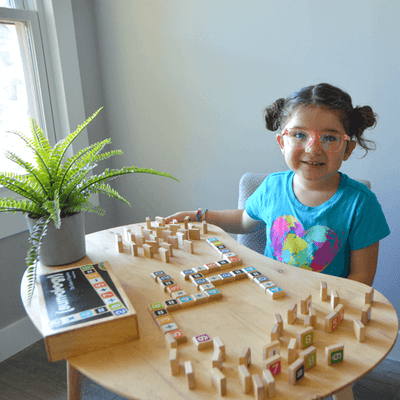 Sumology by SimplyFun is a fun math game focusing on addition, multiplication, subtraction, and division. It's like scrabble for math.