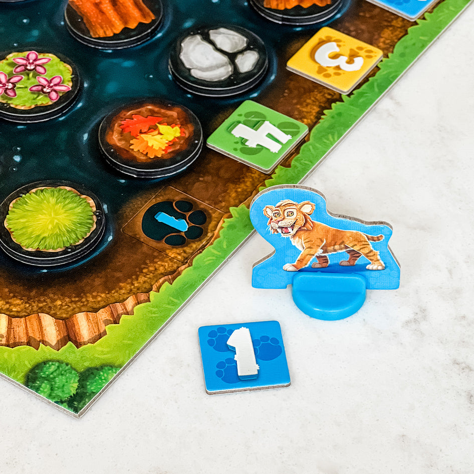 Tar Trackers by SimplyFun is a memory and spatial reasoning game with magnets and cute saber-toothed tigers.