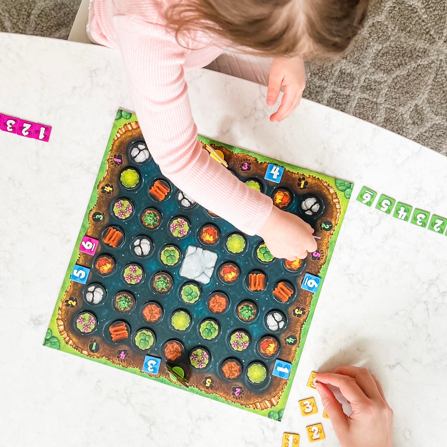 Tar Trackers by SimplyFun is a memory and spatial reasoning game with magnets and cute saber-toothed tigers.