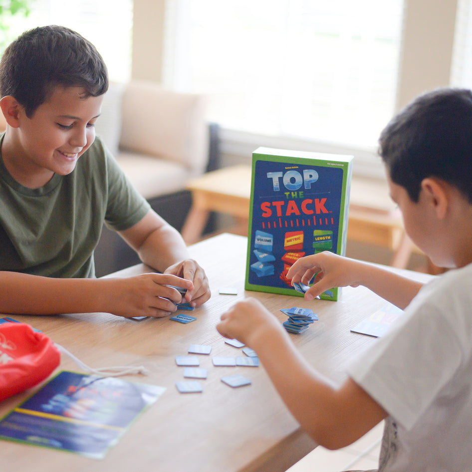 Top the Stack by SimplyFun is a measurement game teaching US standard volume and length and metric length.