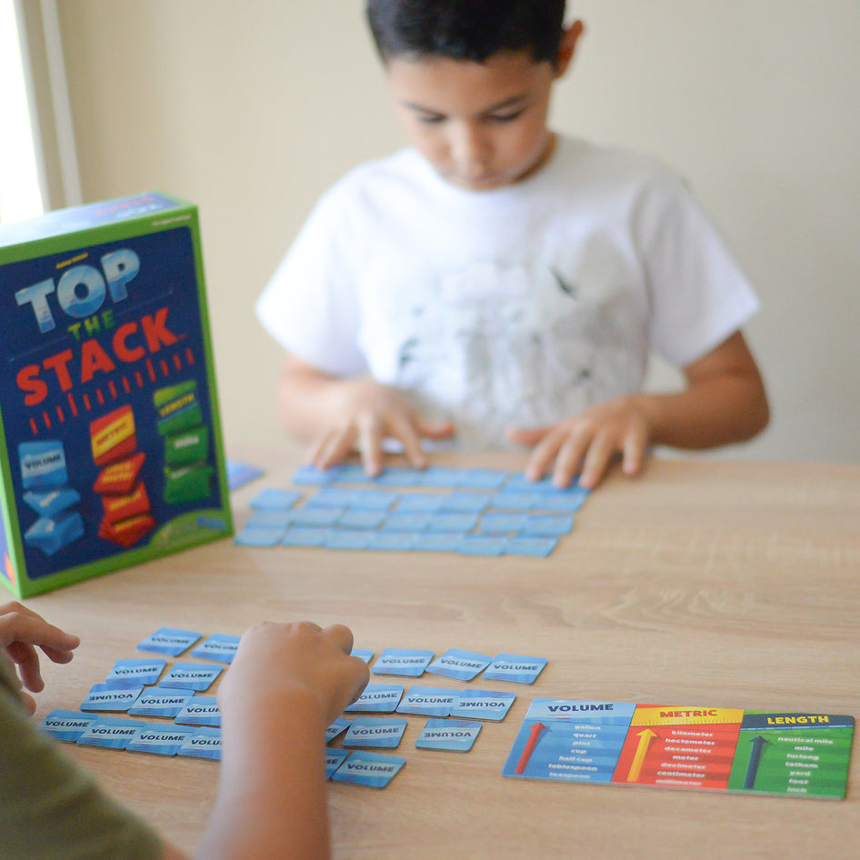 Top the Stack by SimplyFun is a measurement game teaching US standard volume and length and metric length.