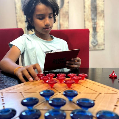 Zone to Zone by SimplyFun is a fun spatial reasoning and probability game featuring a wooden board.