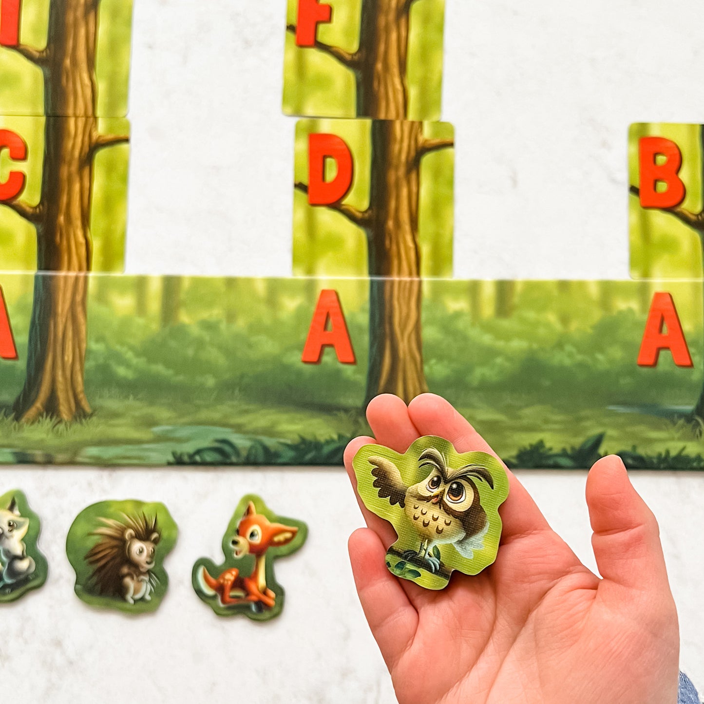 Alphabet Woods educational board game by SimplyFun for kids aged 5 and up