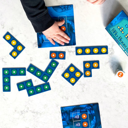 Glow Spotters by SimplyFun is an early addition game which also helps with spatial reasoning for ages 5 and up.