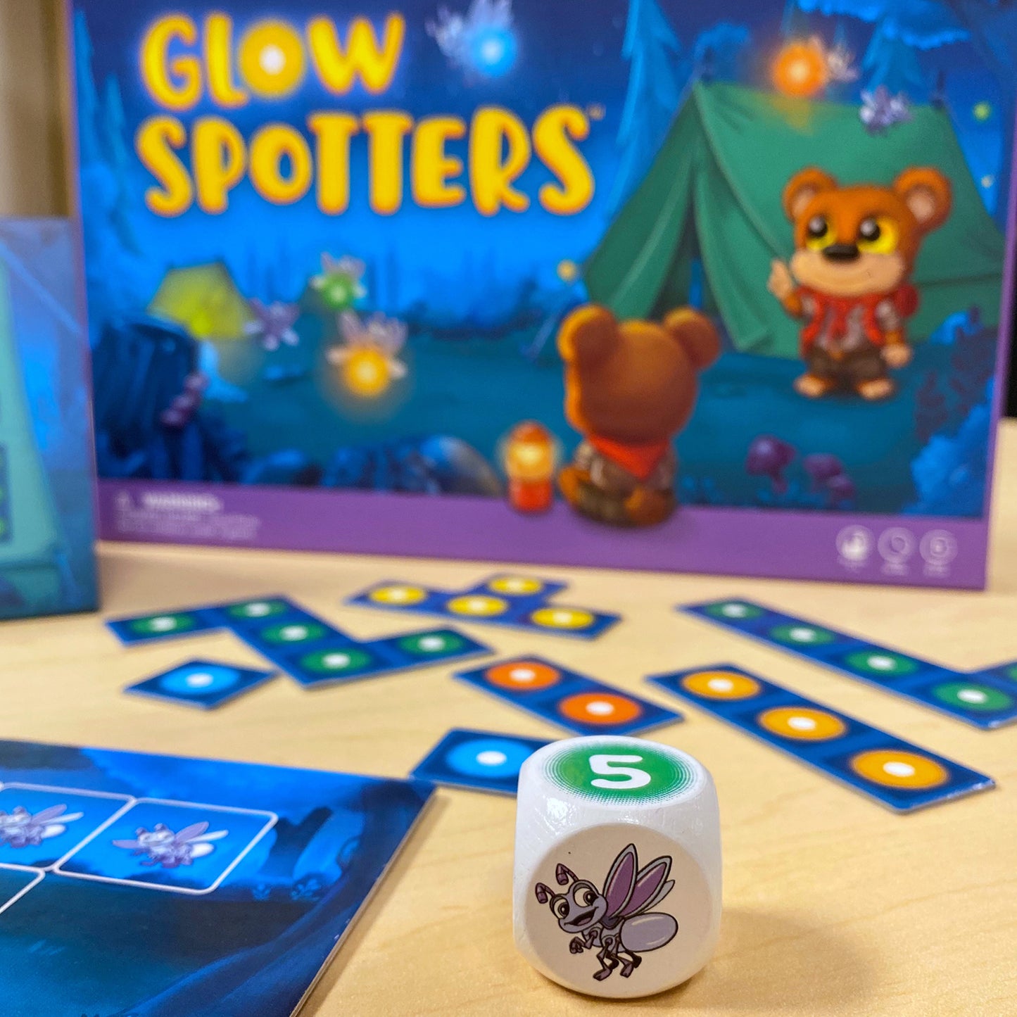 Glow Spotters by SimplyFun is an early addition game which also helps with spatial reasoning for ages 5 and up.