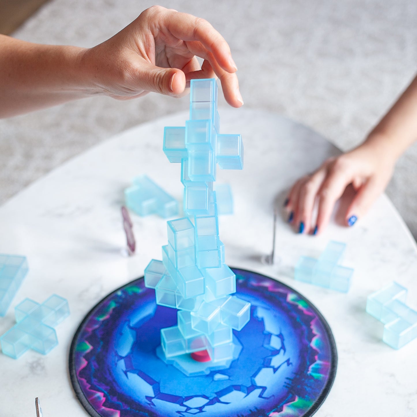 Ice Tumble by SimplyFun is a fun spatial reasoning and block stacking game focusing on fine motor skills for ages 7 and up.