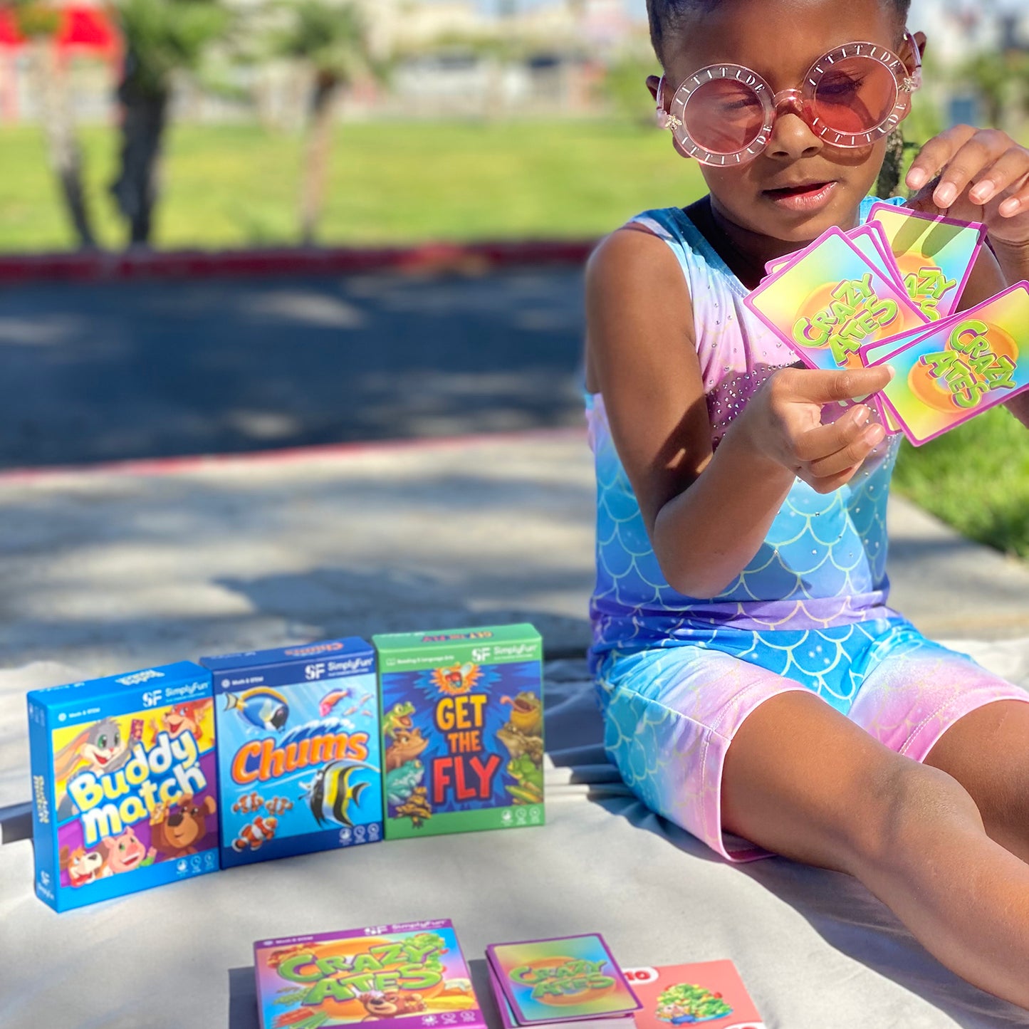 Kids on the Go Card Set by SimplyFun is a fun set of card games focused on colors, shapes, numbers, and letters.