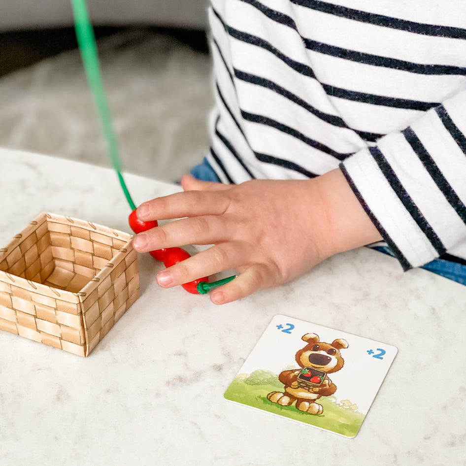 Share a Berry by SimplyFun is an early counting game and fine motor skills game for ages 3 and up.