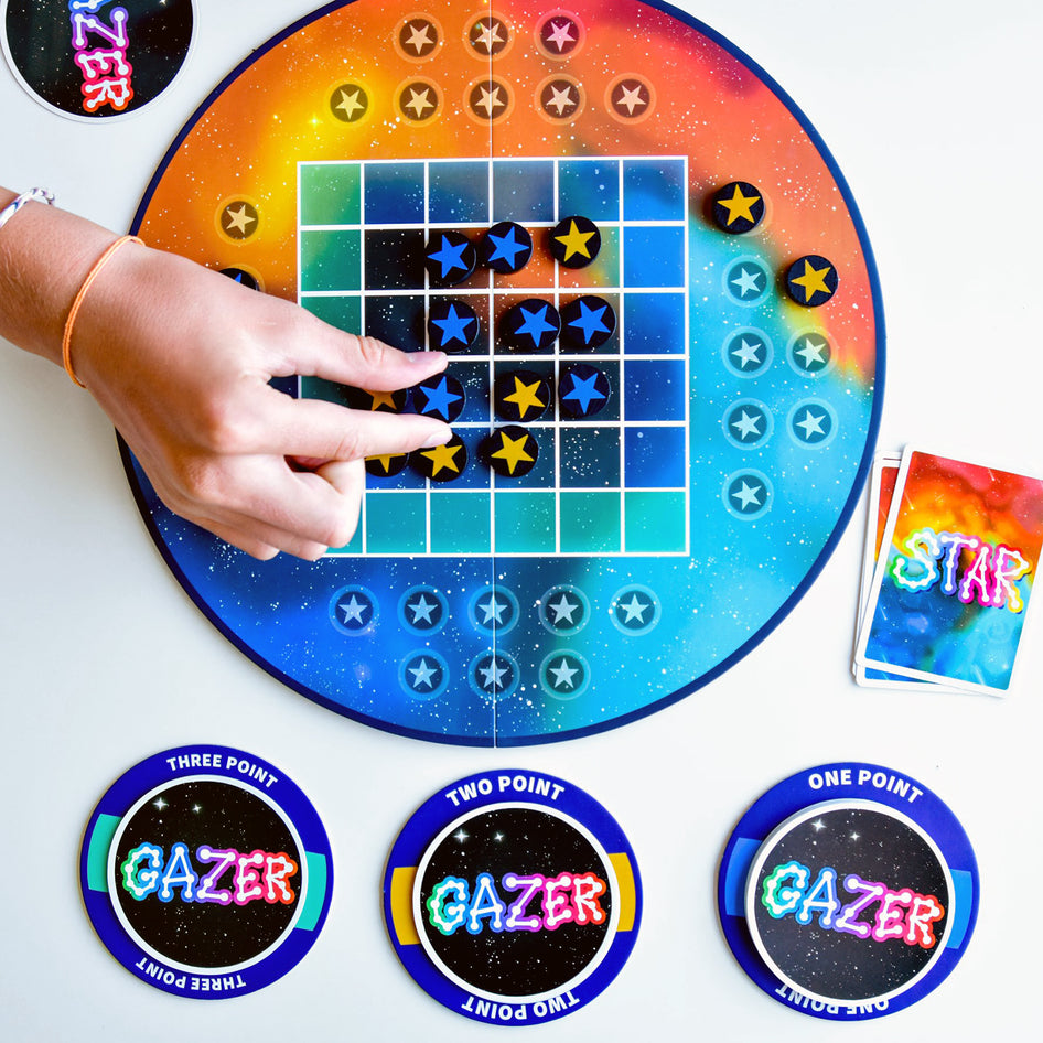 Star Gazer by SimplyFun is a strategy game focusing on spatial reasoning and patterning for ages 10 and up.